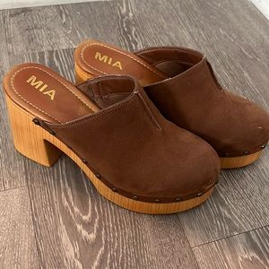 Brown clogs